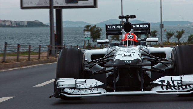 Video Reference: Car, Tire, Land vehicle, Vehicle, Wheel, Sky, Automotive tire, Automotive design, Helmet, Motorsport