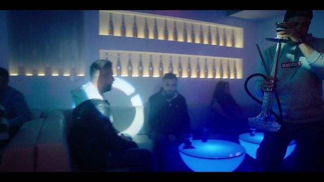 Video Reference: Entertainment, Microphone, Eyewear, Event, Technology, Fun, Electric blue, Display device, T-shirt, Hat