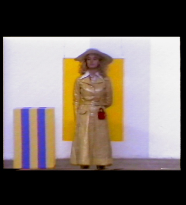 Video Reference: Clothing, Outerwear, Hat, Purple, Sleeve, Street fashion, Violet, One-piece garment, Sun hat, Fashion design