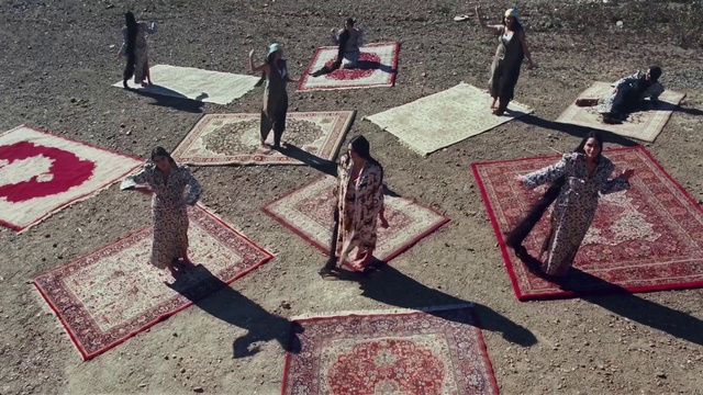 Video Reference: Asphalt, Red, Road surface, Art, Event, Sidewalk, Carmine, Visual arts, Road, Shadow