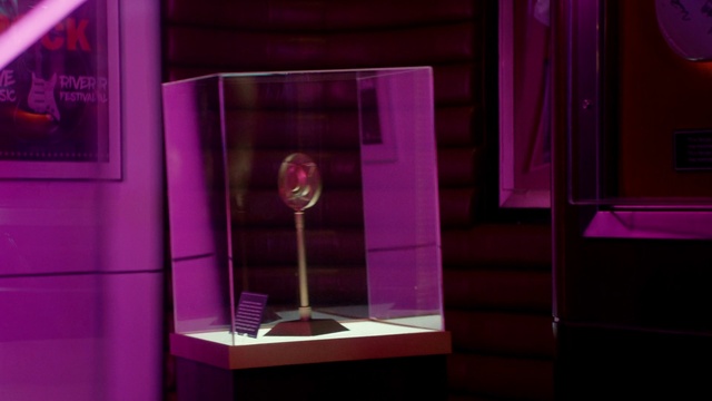 Video Reference: Purple, Interior design, Violet, Pink, Rectangle, Magenta, Material property, Glass, Display case, Eyewear