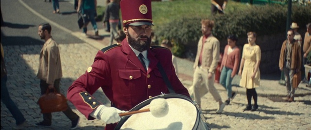 Video Reference: Helmet, Idiophone, Membranophone, Drum, Musical instrument, Beard, Musician, Cap, Military person, Military uniform