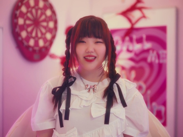 Video Reference: Smile, Hairstyle, Purple, Happy, Pink, Fun, Black hair, Magenta, Event, Bow tie