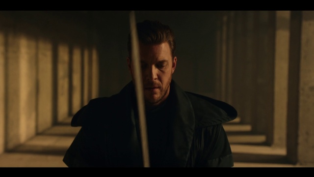 Video Reference: Flash photography, Darkness, Formal wear, Room, Portrait photography, Facial hair, Sitting, Portrait