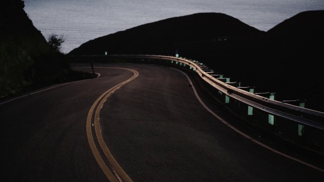 Video Reference: Sky, Road surface, Natural landscape, Asphalt, Mountain, Slope, Mode of transport, Tar, Thoroughfare, Geological phenomenon