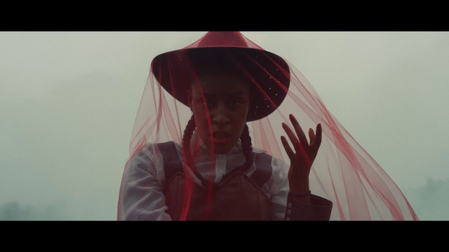 Video Reference: Lip, Hat, Flash photography, Happy, Gesture, Headgear, Magenta, Tints and shades, Sun hat, Eyewear
