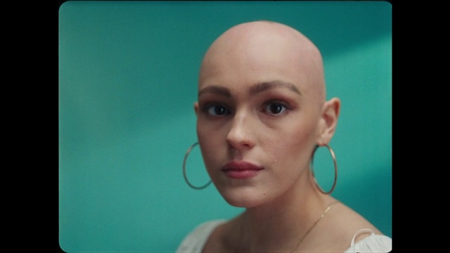 Video Reference: Nose, Eyebrow, Eyelash, Jaw, Flash photography, Art, Rectangle, Chest, Jewellery, Symmetry