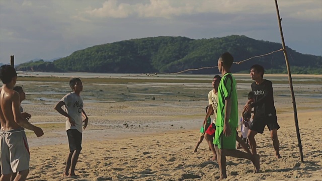 Video Reference: Sky, Cloud, People on beach, Mountain, Water, Trunks, Coastal and oceanic landforms, Beach, Leisure, Horizon