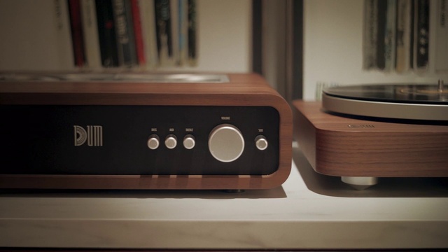 Video Reference: Wood, Musical instrument accessory, Electronic instrument, Gadget, Audio equipment, Communication Device, Hardwood, Media player, Wood stain, Bookcase