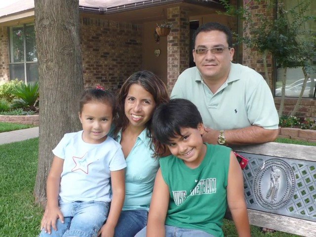 Video Reference: family, portrait, outdoor, bench, parents, children, group, home, garden, smiling, casual, daylight, residential, portrait photography