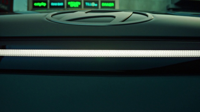 Video Reference: Hood, Automotive design, Automotive lighting, Gadget, Font, Vehicle door, Gas, Automotive exterior, Personal luxury car, Motor vehicle