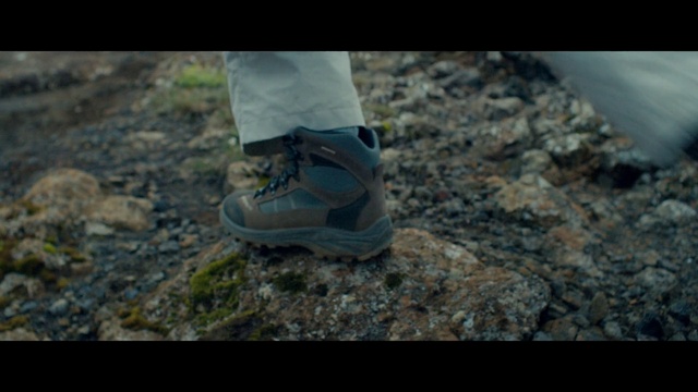 Video Reference: Footwear, Shoe, Walking shoe, Outdoor shoe, Grey, People in nature, Asphalt, Grass, Sneakers, Road surface