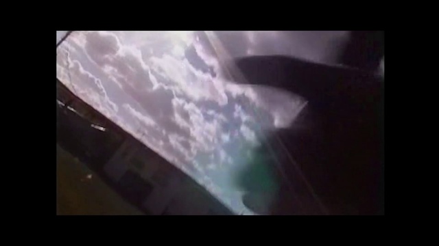 Video Reference: Cloud, Sky, Rectangle, Font, Tints and shades, Window, Automotive exterior, Display device, Technology, Cumulus