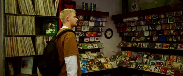 Video Reference: Shelf, Bookcase, Publication, Shelving, Building, Retail, Picture frame, Customer, Eyewear, Library