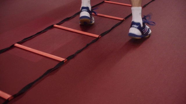 Video Reference: Leg, Wood, Flooring, Floor, Knee, Thigh, Sportswear, Foot, Sock, Human leg