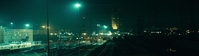 Video Reference: Sky, Street light, Automotive lighting, Building, Electricity, Road surface, Mode of transport, Atmospheric phenomenon, Thoroughfare, Tower block