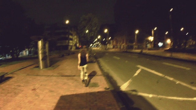 Video Reference: Automotive lighting, Street light, Road surface, Asphalt, Plant, Sidewalk, Tints and shades, Midnight, City, Road