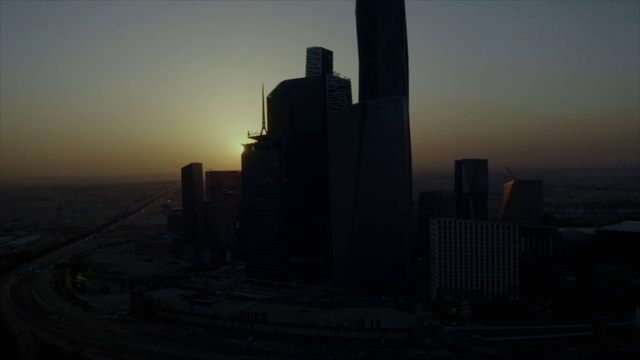 Video Reference: Sky, Building, Skyscraper, Atmosphere, Dusk, Tower block, Cloud, Tower, Plant, Afterglow