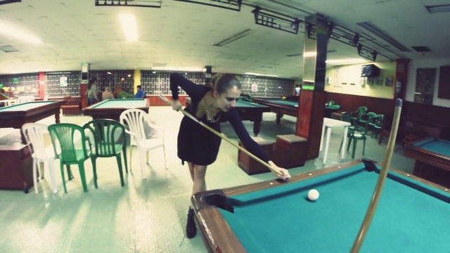 Video Reference: Billiard table, Table, Baize, Billiard room, Pool player, Furniture, Sports equipment, Cue stick, Pool, Billiards