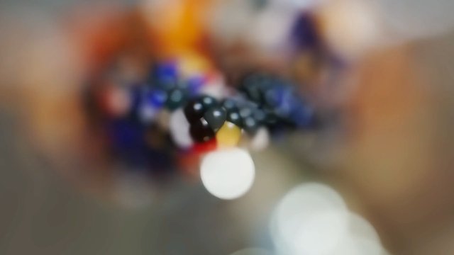 Video Reference: abstract, blurred, out of focus, bokeh, colorful, close-up, lights, indoor, unrecognizable, soft focus