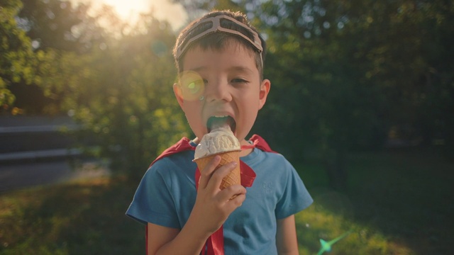 Video Reference: Plant, Gesture, Happy, Grass, People in nature, Ice cream, Tree, Food, Fun, Leisure