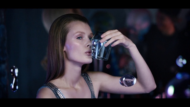 Video Reference: Lip, Eyelash, Flash photography, Entertainment, Audio equipment, Music artist, Camera, Black hair, Gadget, Electric blue