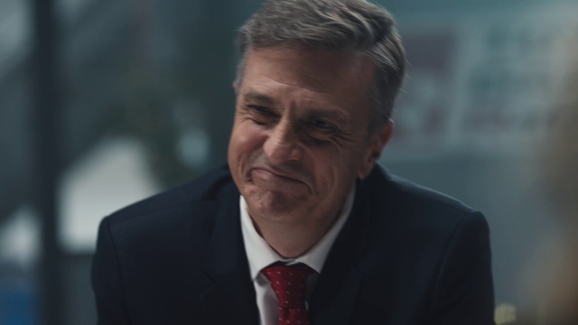 Video Reference: Forehead, Chin, Tie, Coat, Gesture, Dress shirt, Spokesperson, Suit, Collar, Blazer