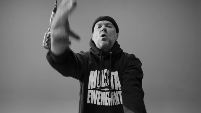 Video Reference: Arm, Flash photography, Sleeve, Music, Gesture, Grey, Style, Entertainment, Black-and-white, Elbow