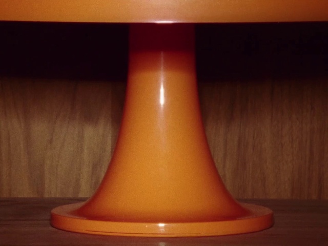 Video Reference: Light, Orange, Wood, Table, Gas, Tints and shades, Heat, Human leg, Art, Hardwood
