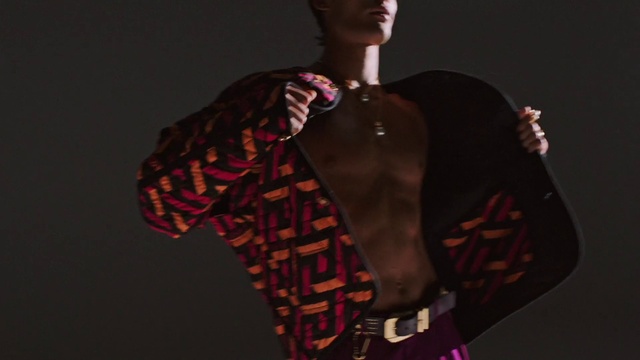 Video Reference: Neck, Sleeve, Gesture, Waist, Dress shirt, Elbow, Chest, Fashion design, Blazer, Trunk