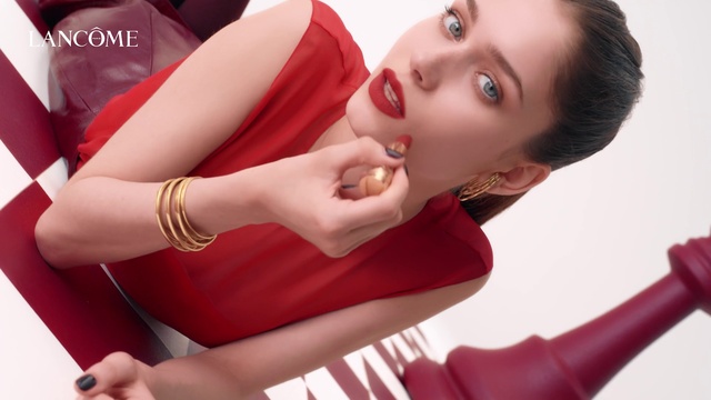 Video Reference: Face, Joint, Skin, Lip, Eye, Eyelash, Neck, Dress, Flash photography, Lipstick