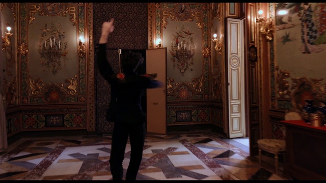 Video Reference: Temple, Wood, Interior design, Art, Flooring, Hardwood, Event, Door, Darkness, Suit