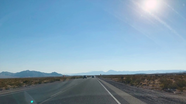 Video Reference: Sky, Ecoregion, Infrastructure, Plant, Road surface, Asphalt, Cloud, Natural landscape, Tar, Thoroughfare
