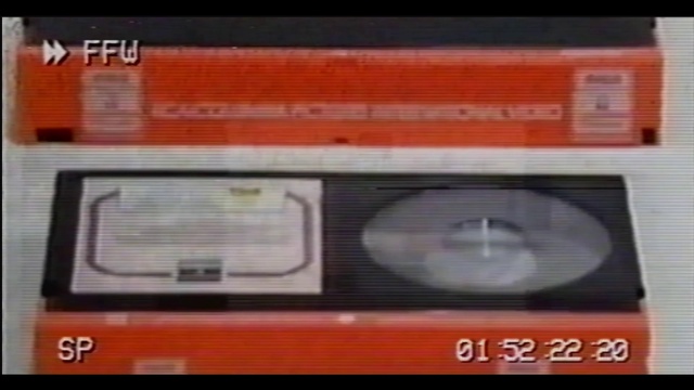 Video Reference: Automotive lighting, Compact cassette, Font, Electronic device, Rectangle, Automotive exterior, Musical instrument accessory, Auto part, Gas, Machine