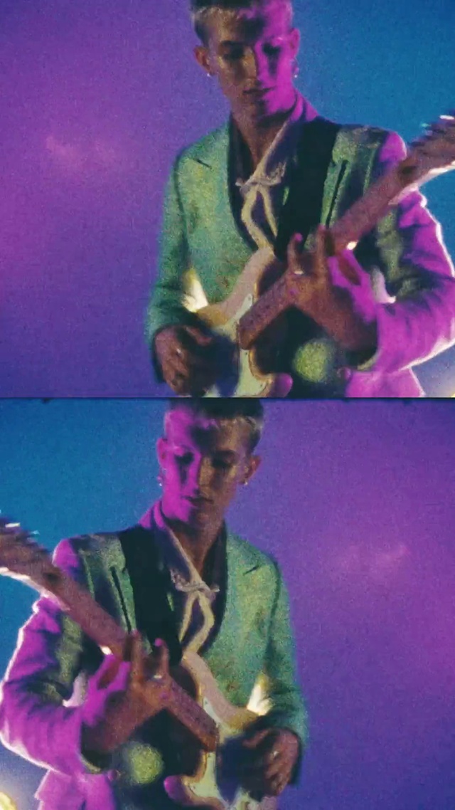 Video Reference: Musical instrument, Hand, Arm, Musician, String instrument, Purple, Concert, Guitar, String instrument, Guitarist
