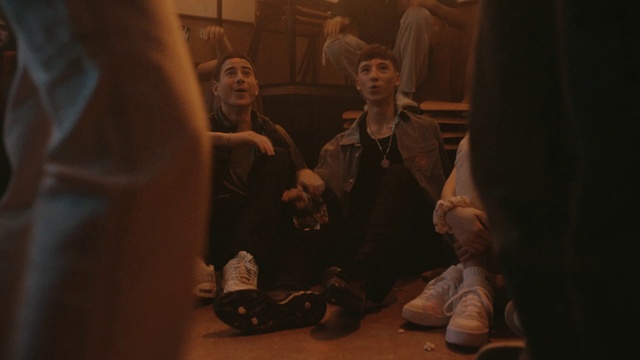 Video Reference: Event, Wood, Darkness, Fun, Sitting, Visual arts, Room, Hat, Conversation, Flooring