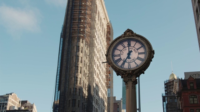 Video Reference: Sky, Daytime, Building, Tower, Clock, Window, Skyscraper, Cloud, City, Tree