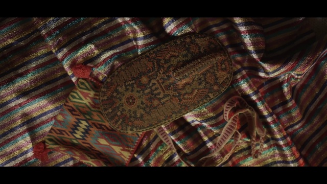 Video Reference: Brown, Tartan, Sleeve, Rectangle, Plaid, Wood, Collar, Tints and shades, Bag, Pattern