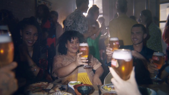 Video Reference: Head, Tableware, Smile, Photograph, Drinkware, Muscle, Beer, Drink, Alcoholic beverage, Interaction