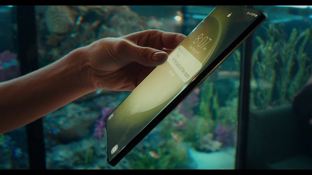 Video Reference: Azure, Gadget, Mobile phone, Gesture, Organism, Sports equipment, Finger, Communication Device, Water, Automotive mirror