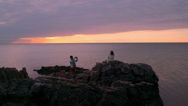 Video Reference: Water, Cloud, Sky, Afterglow, Dusk, Sunset, Coastal and oceanic landforms, Terrain, Horizon, Sunrise