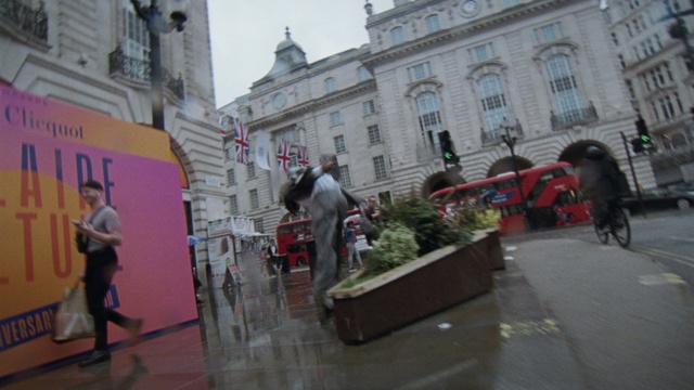 Video Reference: Building, Plant, Window, Architecture, Public space, City, Travel, Road, Event, Facade