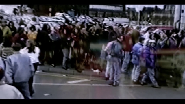 Video Reference: Event, Crowd, Pedestrian, Entertainment, Road, Performing arts, Public event, Street, Fan, City