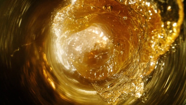 Video Reference: Liquid, Fluid, Amber, Ingredient, Drink, Circle, Astronomical object, Space, Close-up, Sugar substitute