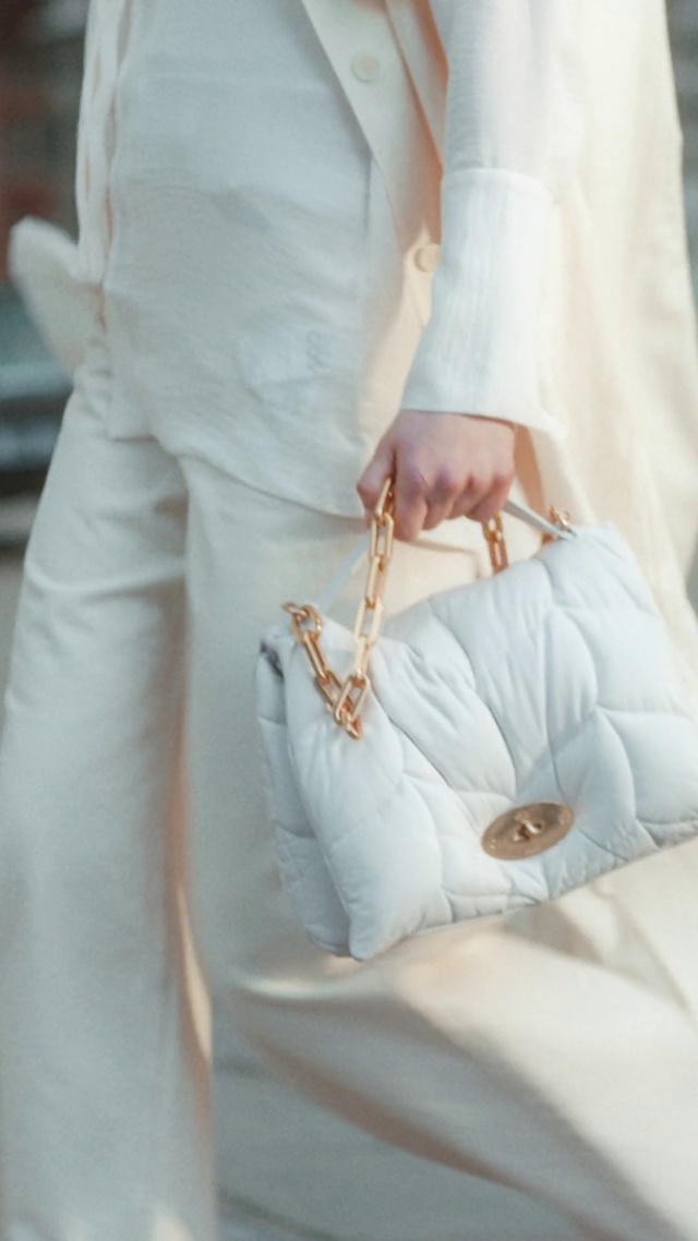 Video Reference: Shoulder, Dress, Human body, Neck, Dress shirt, Sleeve, Waist, Gesture, Nail, Wrist