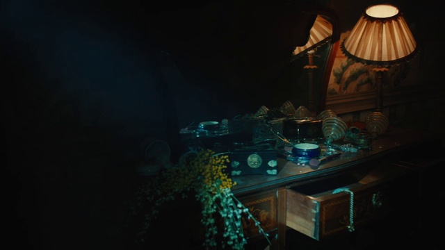 Video Reference: Table, Drawer, Desk, Tints and shades, Lamp, Cabinetry, Electric blue, Building, Event, Darkness