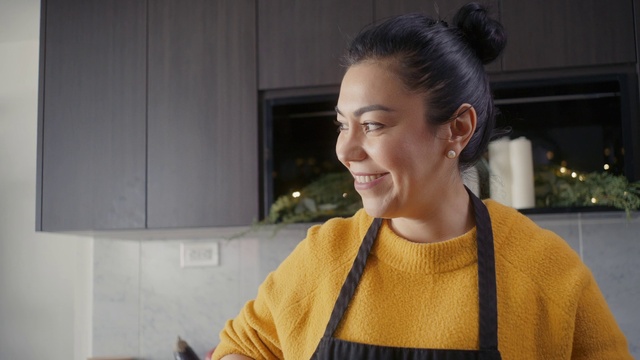 Video Reference: Smile, Shoulder, Facial expression, Neck, Ear, Sleeve, Flash photography, Happy, Bun, Street fashion