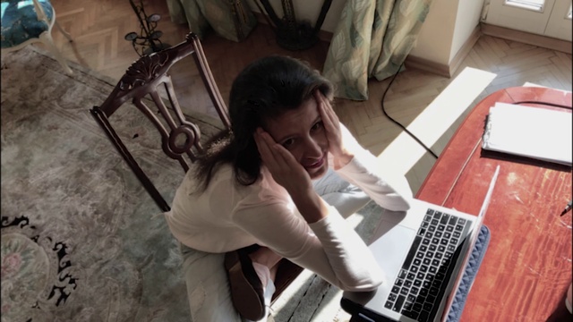 Video Reference: Computer, Laptop, Personal computer, Netbook, Typing, Input device, Touchpad, Office equipment, Table, Flooring