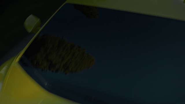 Video Reference: Hood, Netbook, Automotive exterior, Automotive design, Vehicle door, Tints and shades, Windscreen wiper, Rectangle, Font, Electric blue