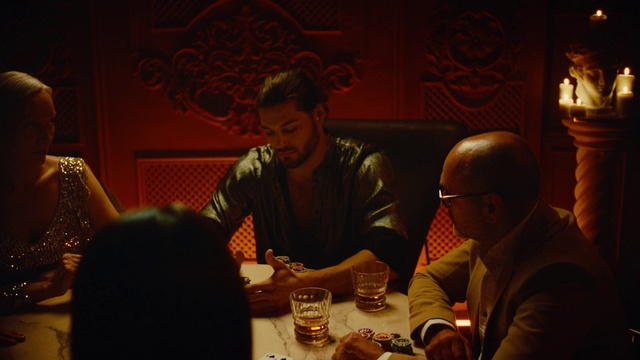 Video Reference: Tableware, Table, Drinkware, Interaction, Alcoholic beverage, Drink, Event, Tie, Conversation, Suit